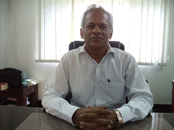 M. Thiru Navukkarasu, Umuyobozi Mukuru w'uruganda Kabuye Sugar Works SARL.