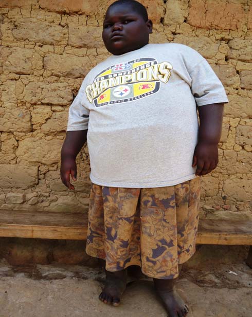 Muhimpundu afite uburebure bwa metero 1.40 no mu nda naho hangana gutyo. Photo/N.Leonard