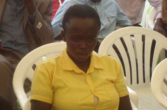 Uwimana Angelique waguze ubutaka bwagenewe ubworozi akabuhingaho.