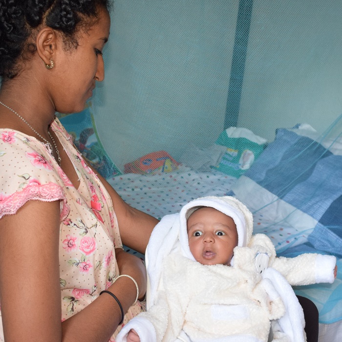 Hewan yishimiye ko umwana yabyariye mu Rwanda afite amahirwe umubyeyi we atigeze abona (Ifoto: UNHCR Rwanda)